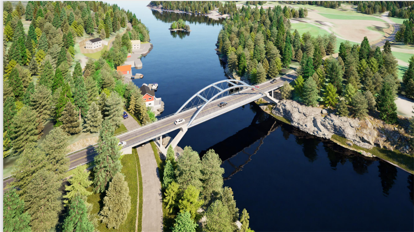 Ilustrasjonsbilde av ei bru over eit sund. Under brua går ein veg. Det er hus og skog langs sjølinja. 